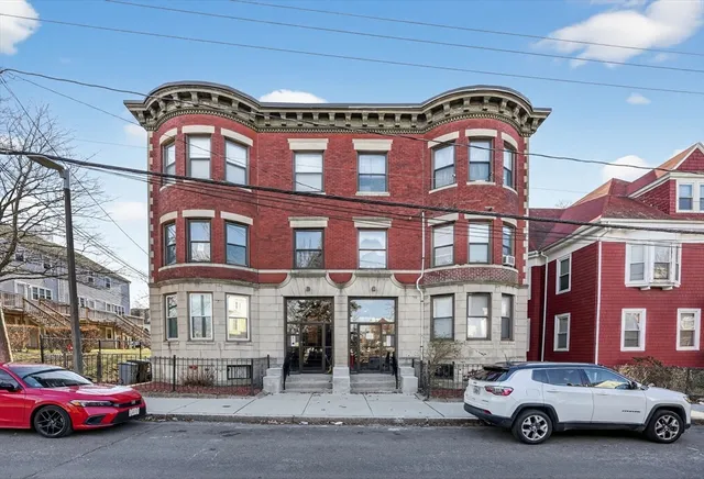 a car parked in front of a building