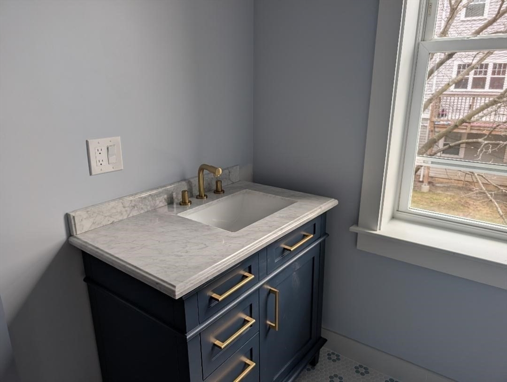 31 Homestead Street, Unit 2 Boston, MA 02121 - Photo 21 of 23 a bathroom with a sink and a window