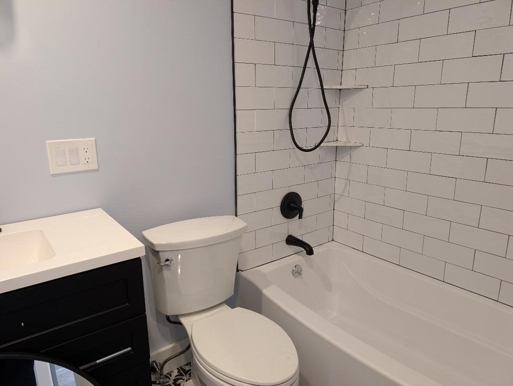 31 Homestead Street, Unit 2 Boston, MA 02121 - Photo 22 of 23 a bathroom with a toilet and a shower