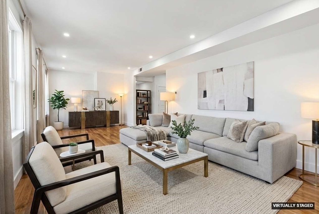 31 Homestead Street, Unit 2 Boston, MA 02121 - Photo 8 of 23 a living room with furniture and a table