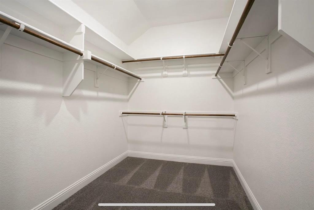 4432 Thalia Way Forney, TX 75126 - Photo 15 of 16 a view of an empty walk in closet