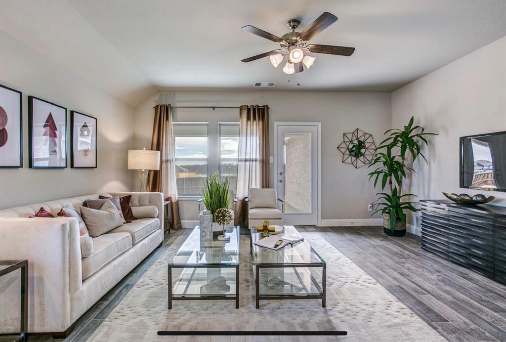4432 Thalia Way Forney, TX 75126 - Photo 9 of 16 a living room with furniture