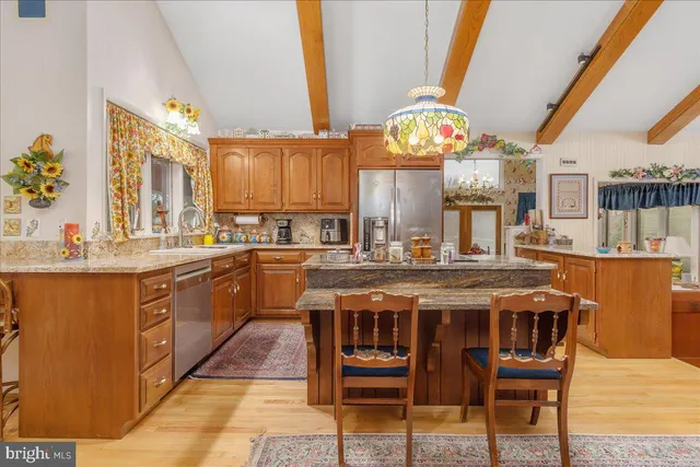 a bed sitting in a room next to a window