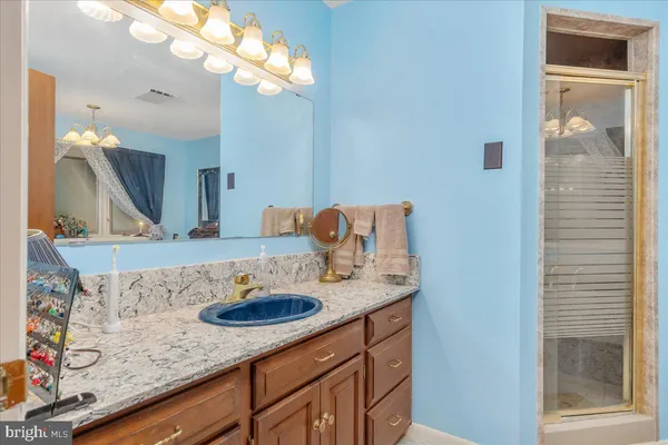 a utility room with sink dryer and washer