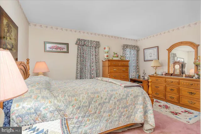 a view of a livingroom with furniture and window
