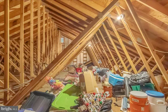 a view of a swimming pool with an outdoor space and seating area
