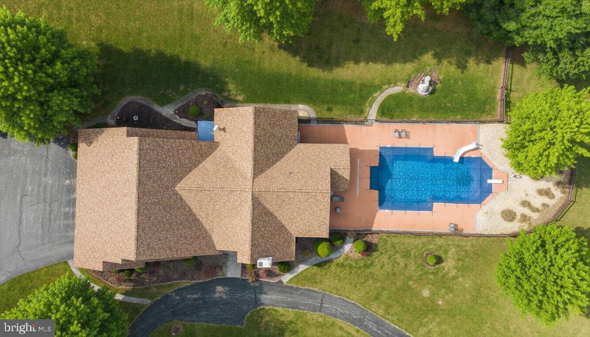 19850 Cool Hollow Road Hagerstown, MD 21740 - Photo 60 of 63 an aerial view of a house with swimming pool and large trees