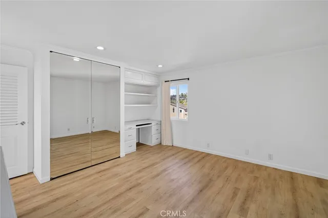 a spacious bathroom with a granite countertop sink a toilet and shower