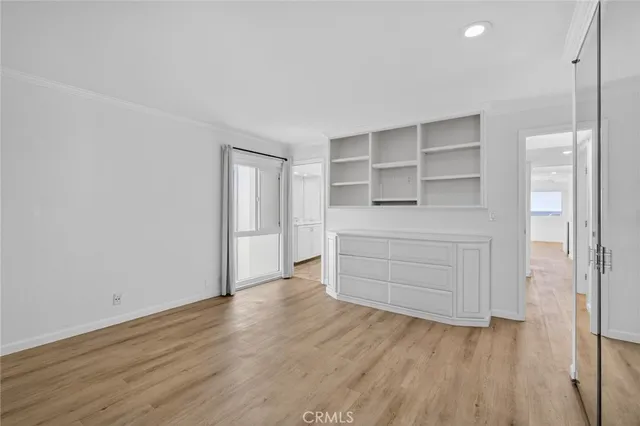 a bathroom with a sink double vanity and a mirror