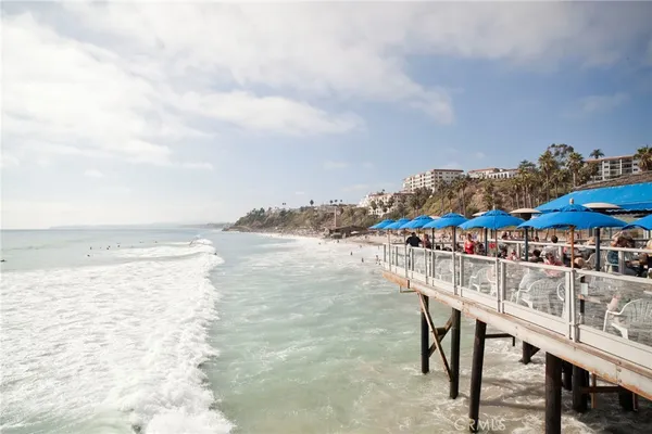 a view of a balcony with an ocean