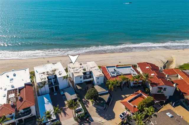 a view of buildings with ocean view