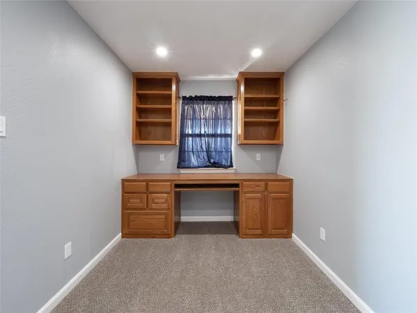 a room with furniture and window