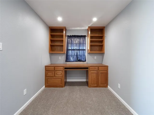 a room with furniture and window