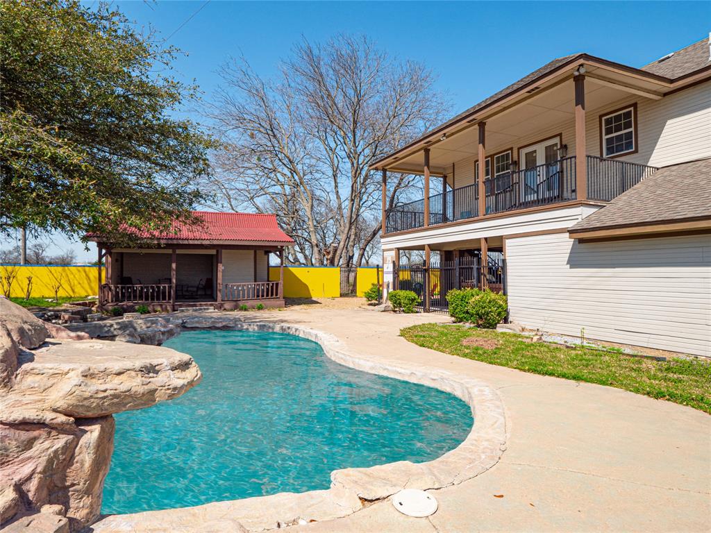 7321 North State Highway Blue Ridge, TX 75424 - Photo 6 of 30 a front view of a house with garden and porch