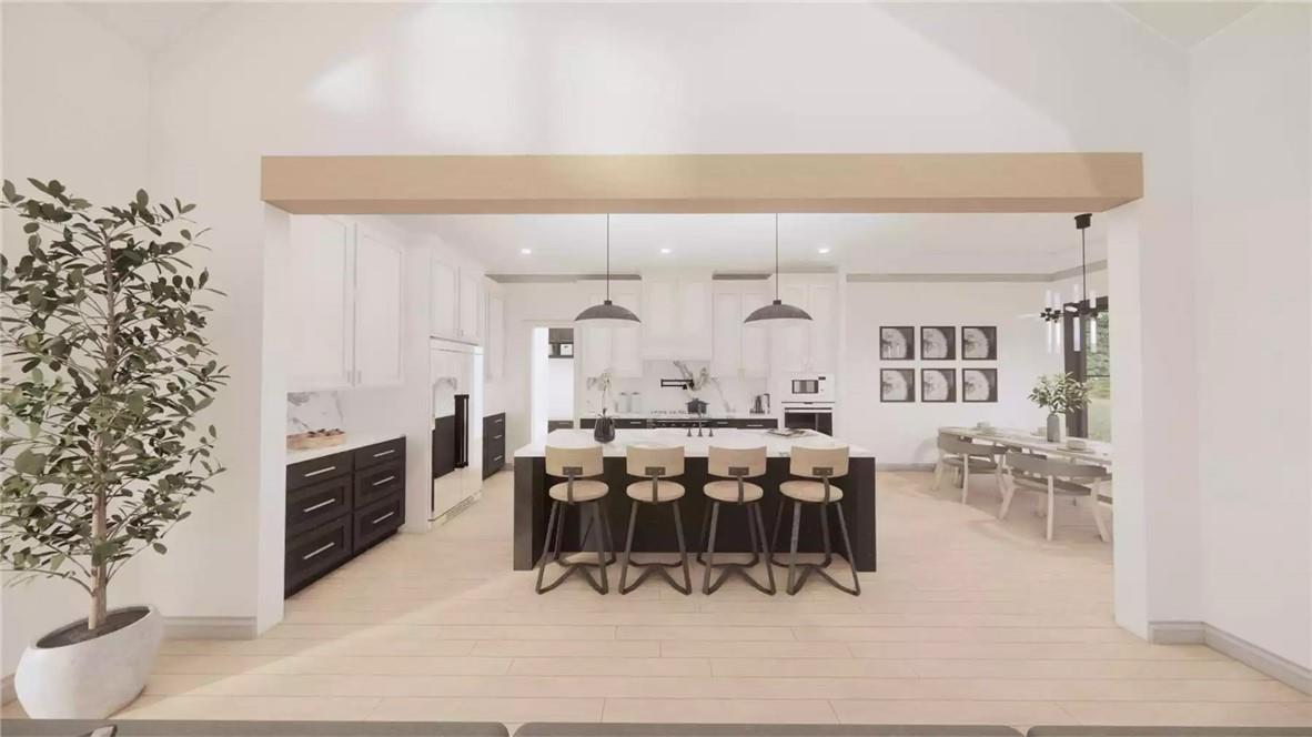 204 Rogers Road Pendleton, SC 29670 - Photo 6 of 12 This kitchen features a central island, creating an inviting space for culinary endeavors and gatherings.