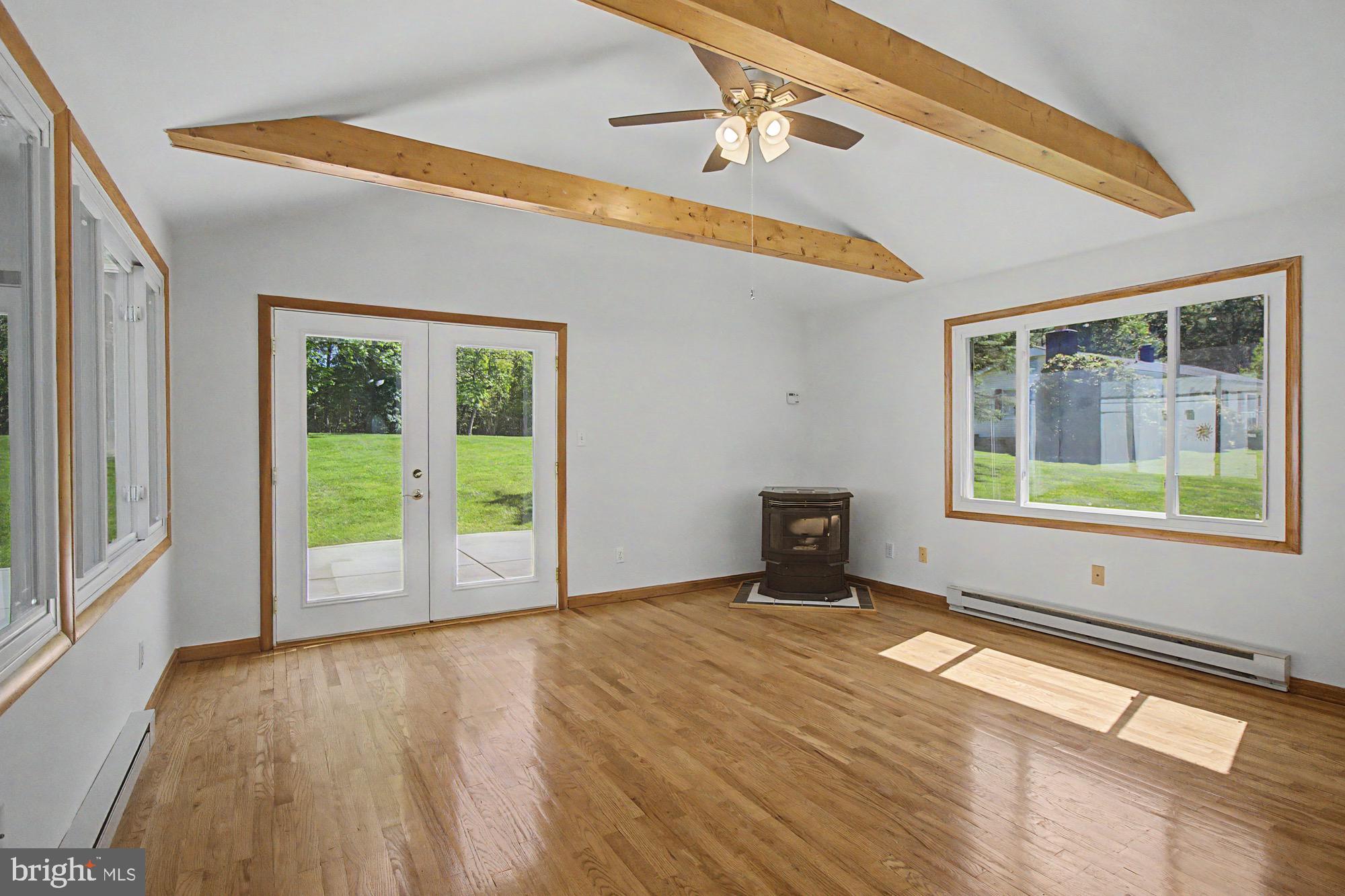 819 Walters Mill Road Forest Hill, MD 21050 - Photo 20 of 47 Family room with stand alone pellet stove