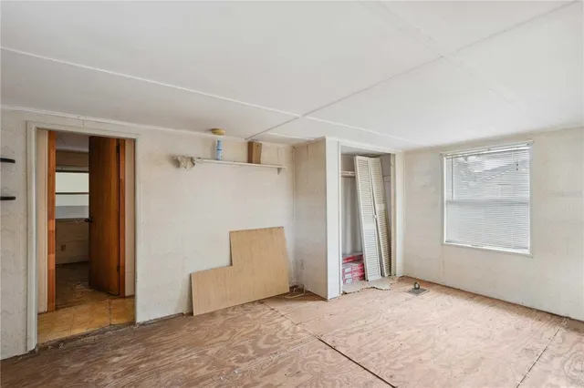 an empty room with windows