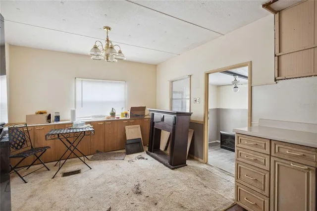 a view of a workspace with furniture