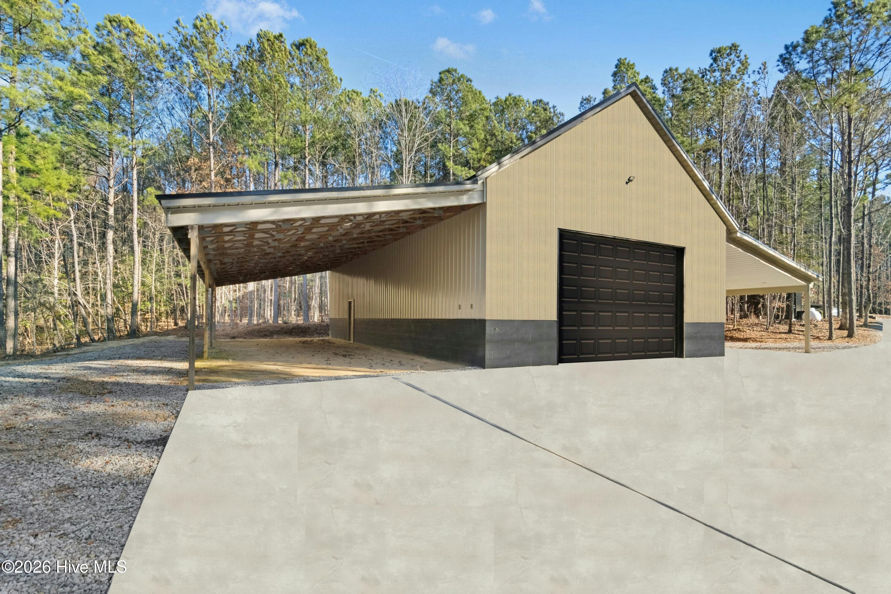 9192 New Sandy Hill Church Road Middlesex, NC 27557 - Photo 4 of 9 2493 S/F Heated and cooled barndominium style barn.