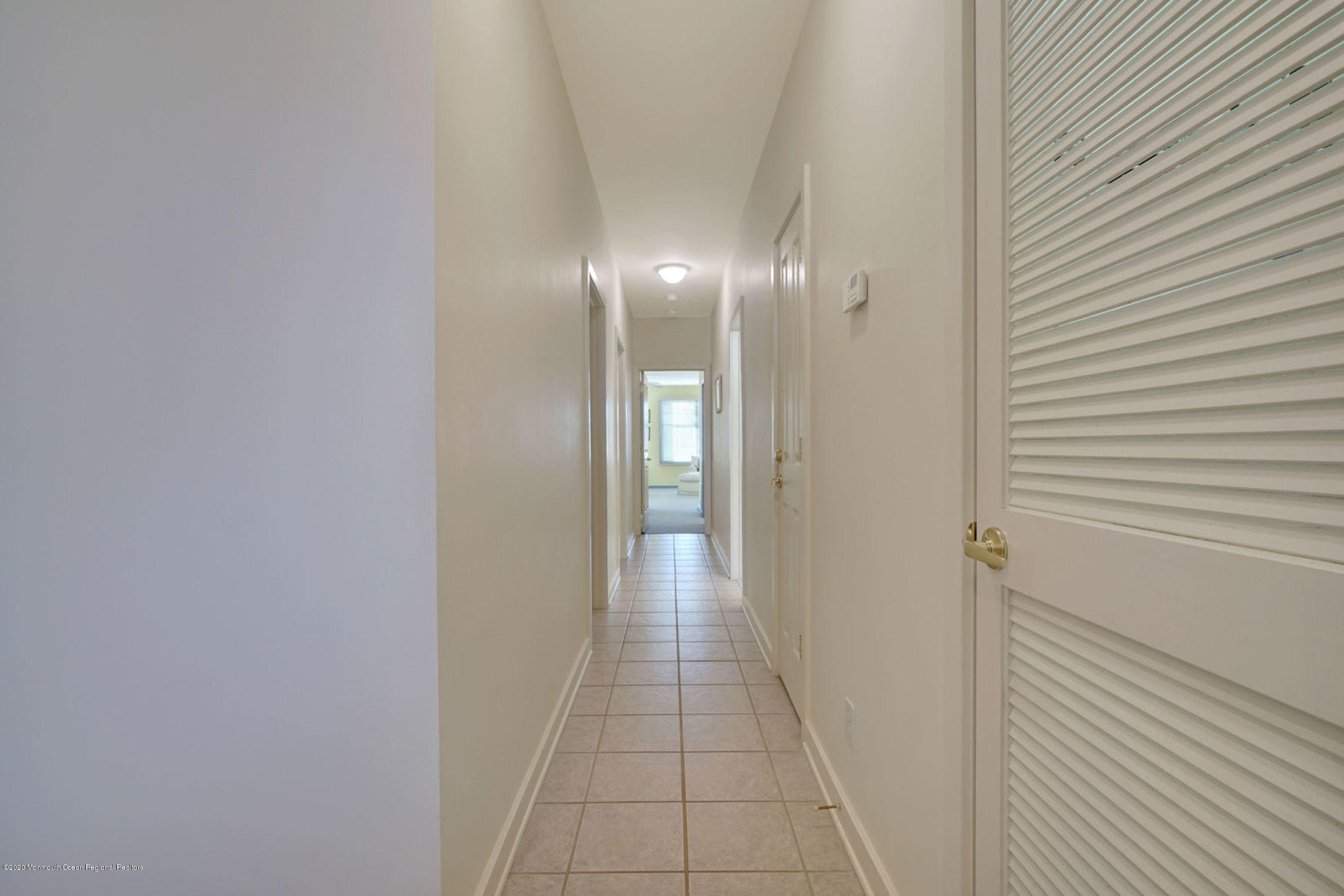 209 Beach Front, Unit 1 Manasquan, NJ 08736 - Photo 14 of 40 a view of a hallway