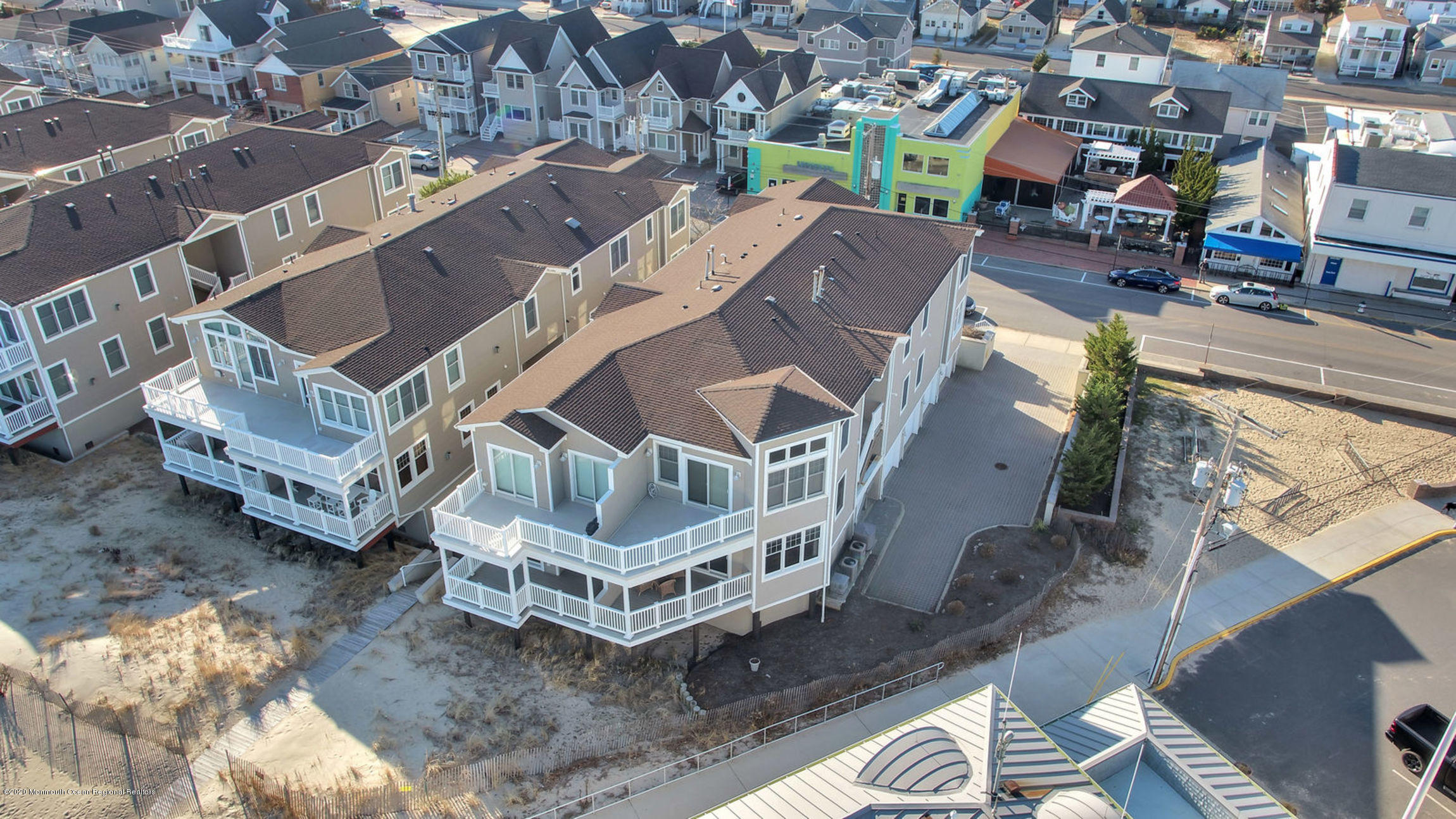 209 Beach Front, Unit 1 Manasquan, NJ 08736 - Photo 31 of 40 a view of a house with a yard