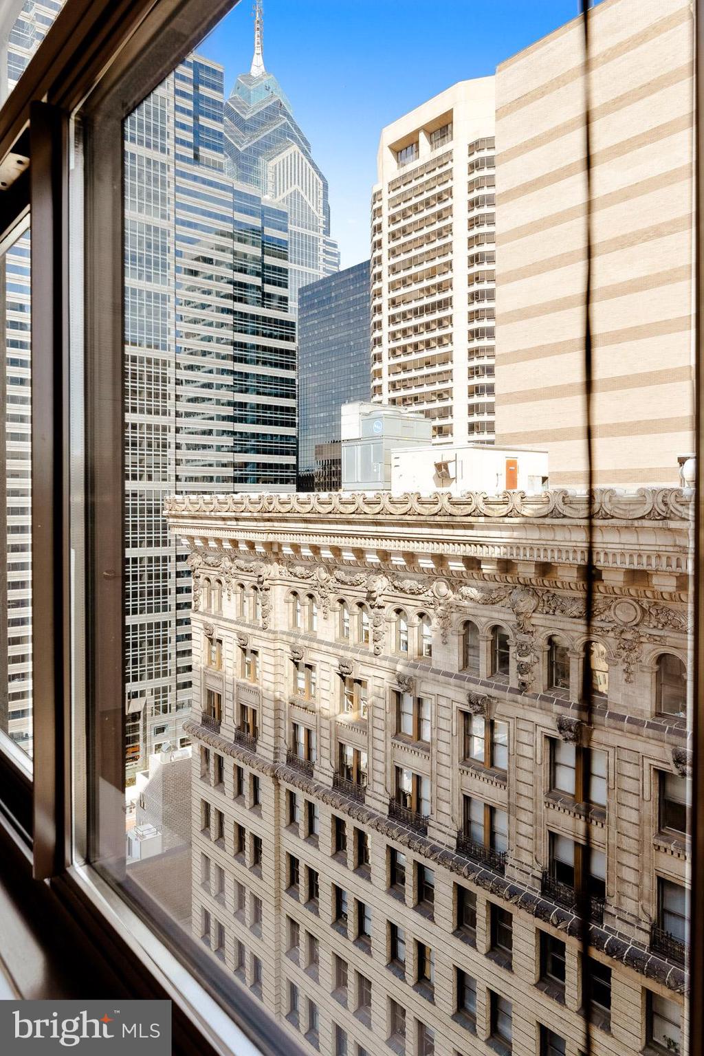1500-00 Chestnut Street, Unit 19F Philadelphia, PA 19102 - Photo 6 of 33 a view of a balcony and a window