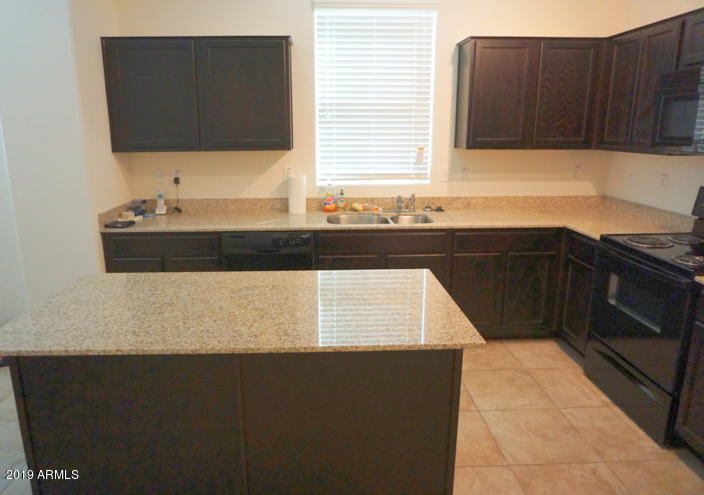 4734 West Fremont Rd. Laveen, AZ 85339 - Photo 8 of 29 Kitchen 2
