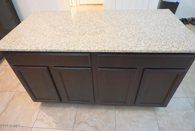 4734 West Fremont Rd. Laveen, AZ 85339 - Photo 10 of 29 Kitchen Island