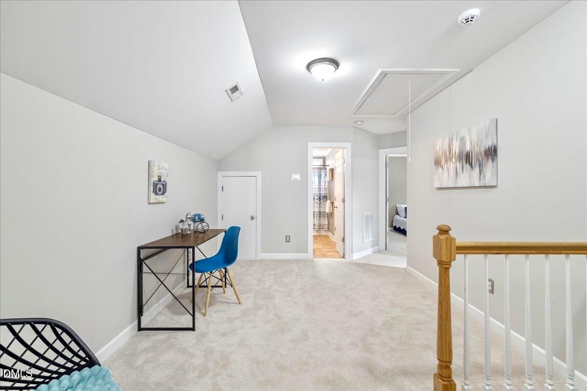 3205 Suncrest Village Lane Raleigh, NC 27616 - Photo 13 of 29 a living room with furniture and a window