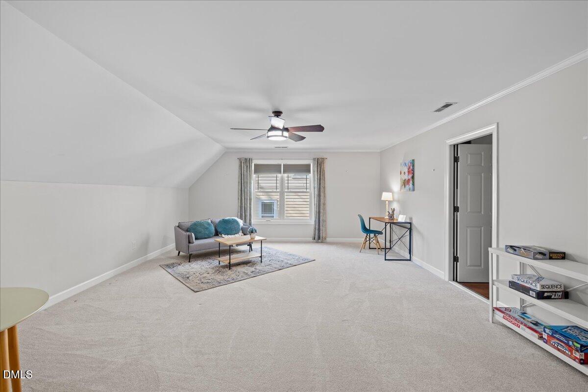 3205 Suncrest Village Lane Raleigh, NC 27616 - Photo 14 of 29 a living room with furniture and a window