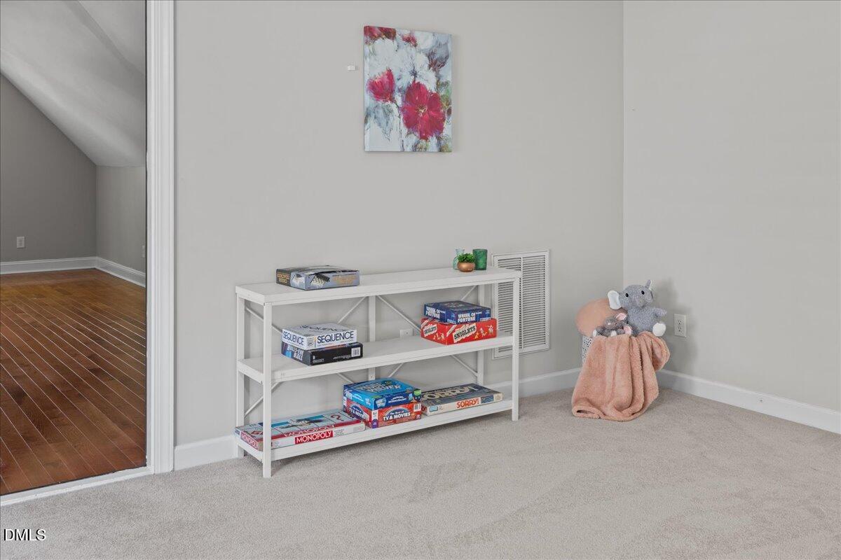 3205 Suncrest Village Lane Raleigh, NC 27616 - Photo 16 of 29 a room with toys and storage