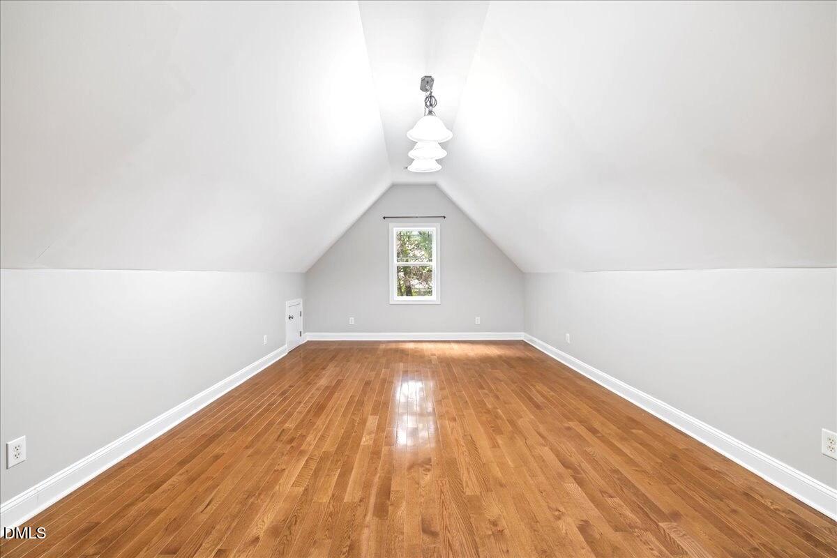 3205 Suncrest Village Lane Raleigh, NC 27616 - Photo 17 of 29 a view of empty room with wooden floor and fan