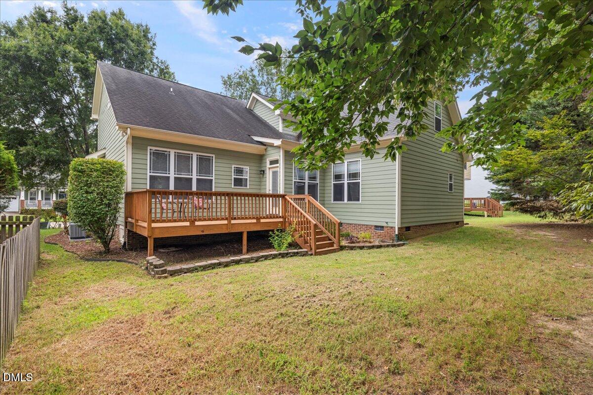 3205 Suncrest Village Lane Raleigh, NC 27616 - Photo 26 of 29 a view of a house with a yard and sitting area