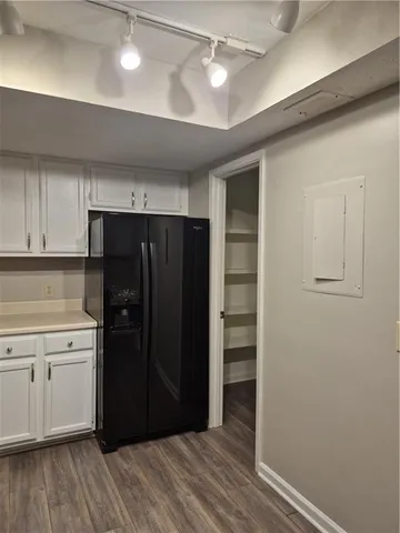 a bathroom with a granite countertop sink a mirror and a