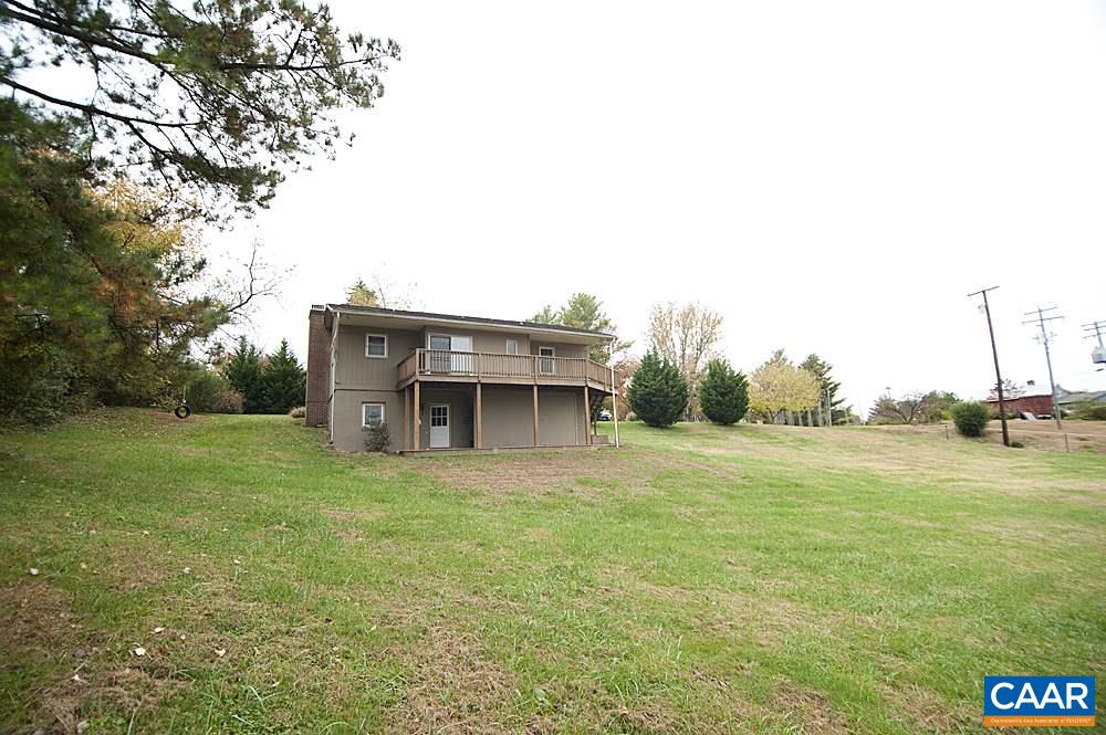 3880 Stony Point Road Keswick, VA 22947 - Photo 3 of 21 a front view of a house with a yard
