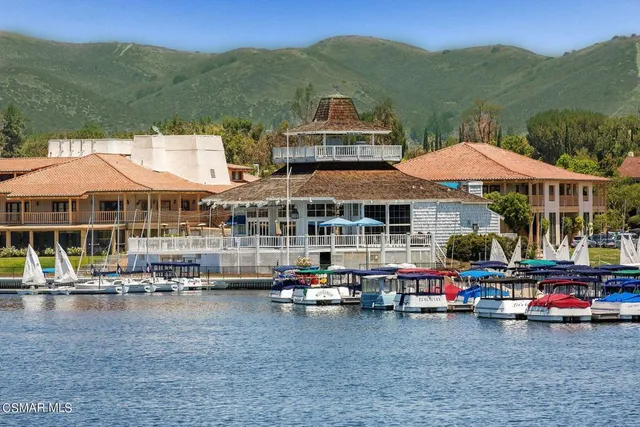 an outdoor space with patio and mountain view
