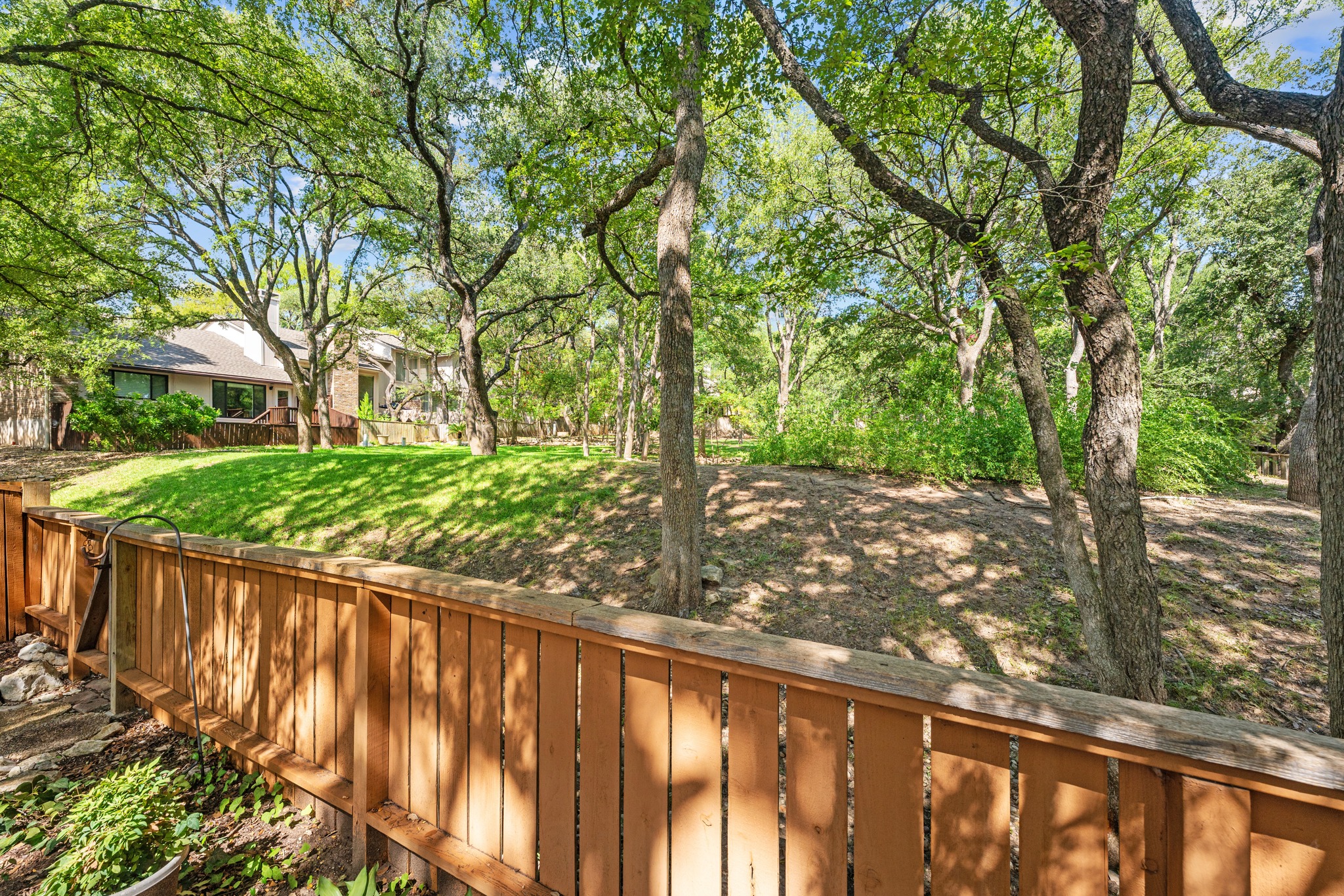 8318 Bent Tree Road Austin, TX 78759 - Photo 30 of 37 The property backs up directly to a quiet community greenspace, providing a permanent window to nature