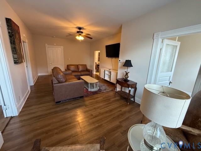 101 South Main Street, Unit B Blackstone, VA 23824 - Photo 2 of 7 a living room with furniture and a flat screen tv
