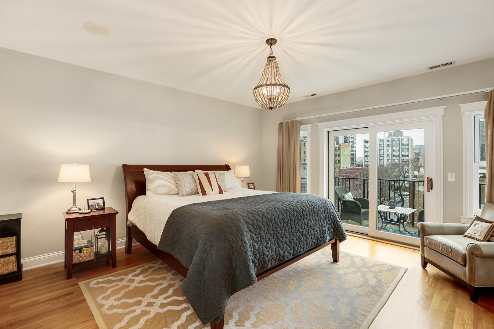 456 West Briar Place, Unit 4 Chicago, IL 60657 - Photo 13 of 30 a bedroom with bed and a large window