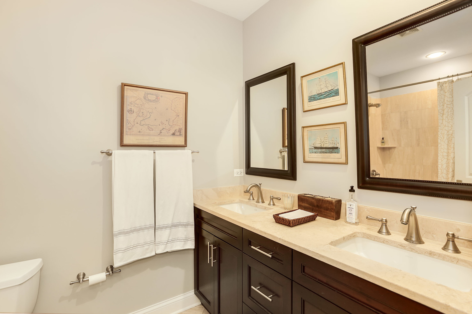 456 West Briar Place, Unit 4 Chicago, IL 60657 - Photo 21 of 30 a bathroom with a sink a toilet and a mirror