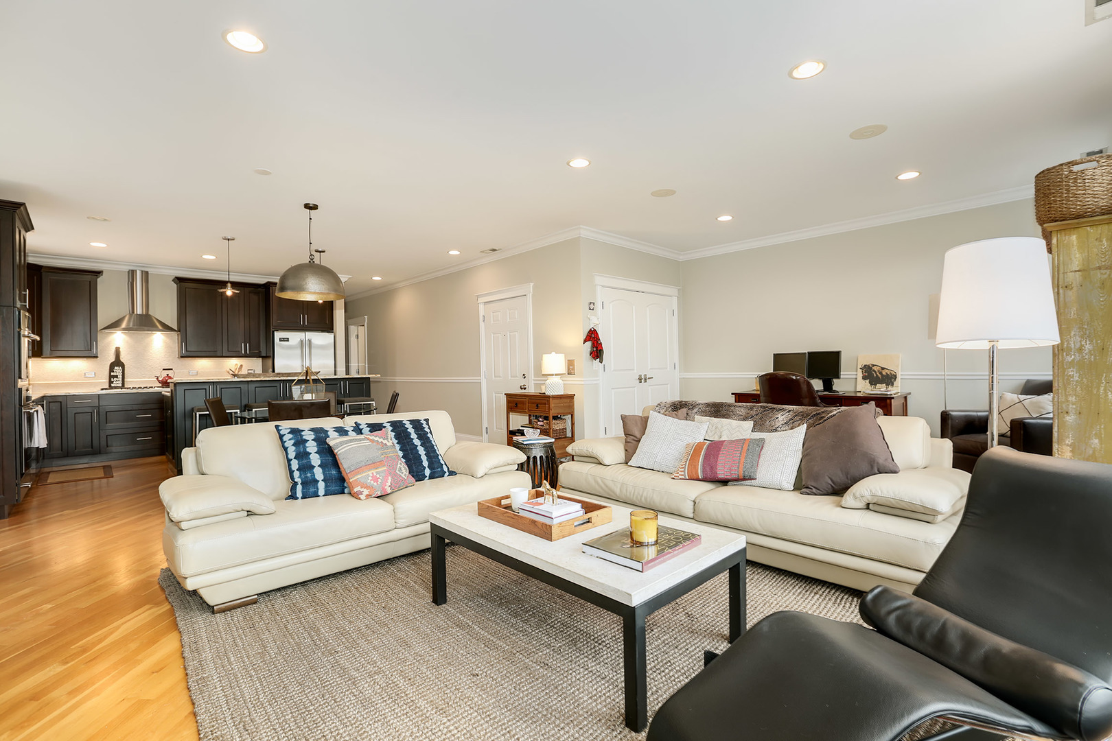 456 West Briar Place, Unit 4 Chicago, IL 60657 - Photo 4 of 30 a living room with furniture and a wooden floor