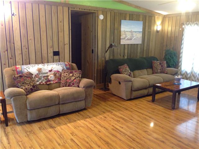 3832 Flewellyn Road Springfield, TN 37172 - Photo 6 of 19 a living room with furniture and a large window