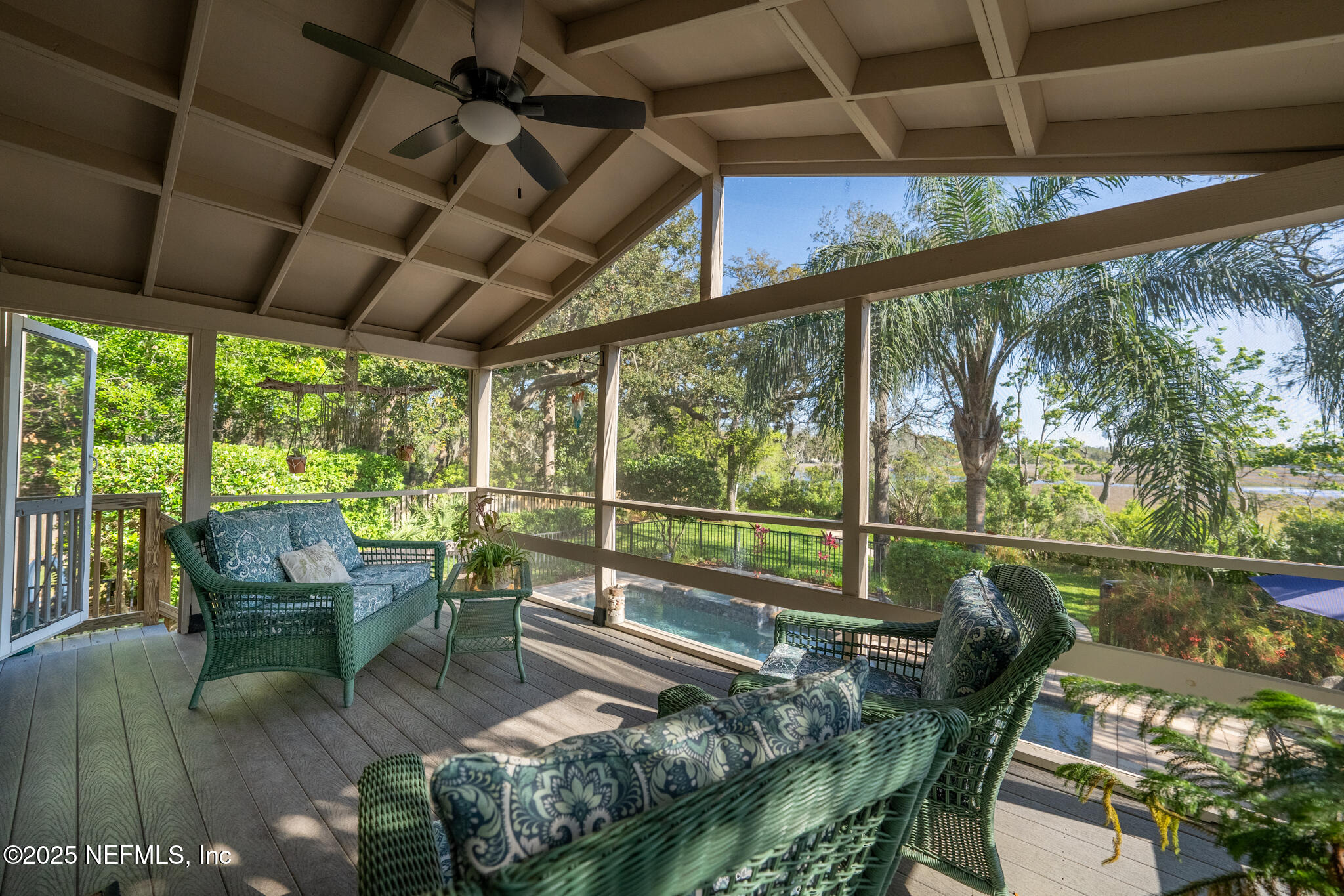 1836 Nightfall Drive Neptune Beach, FL 32266 - Photo 14 of 56 a sitting area with furniture and wooden deck