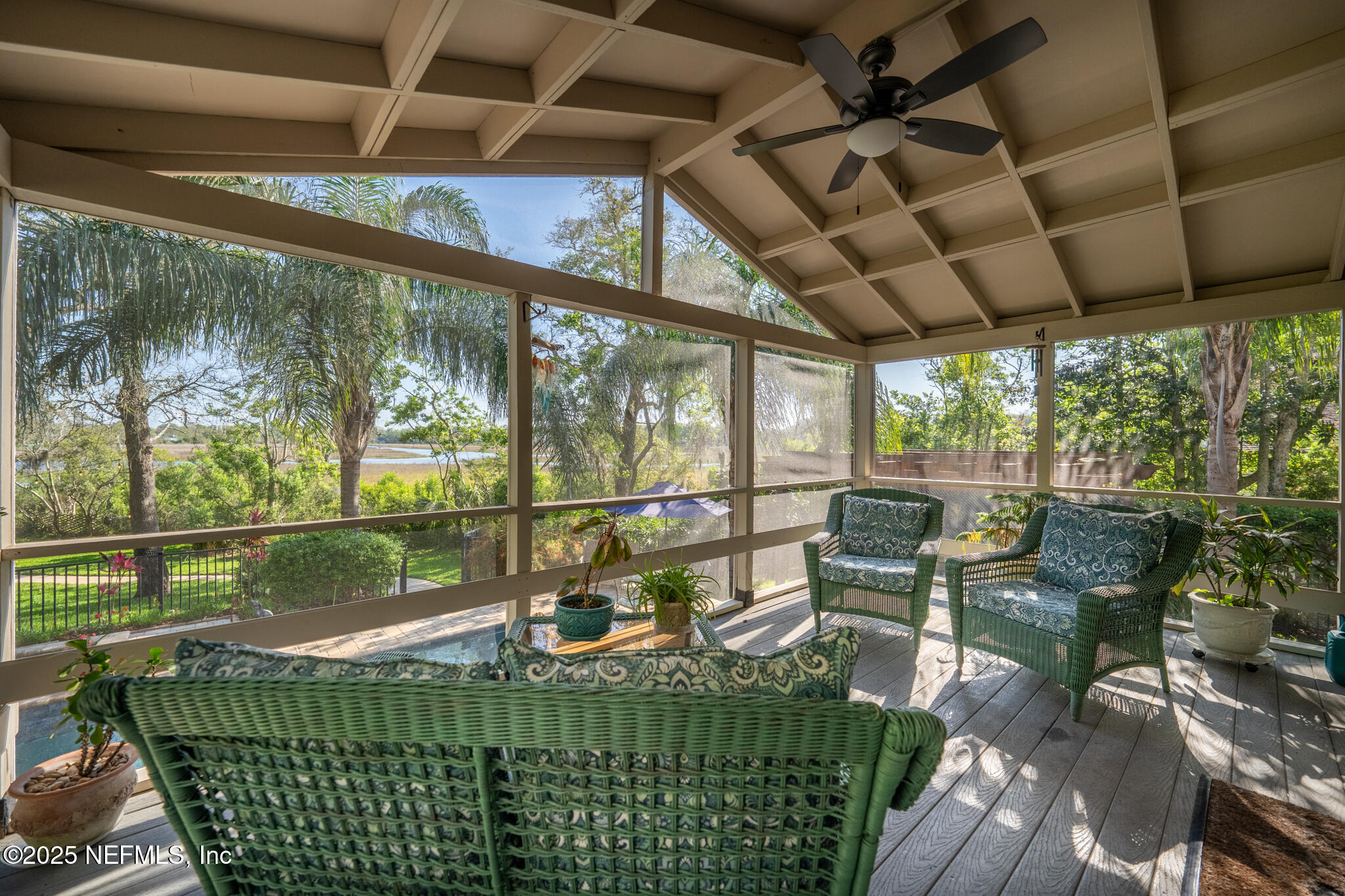 1836 Nightfall Drive Neptune Beach, FL 32266 - Photo 15 of 56 a roof deck with table and chairs and potted plants