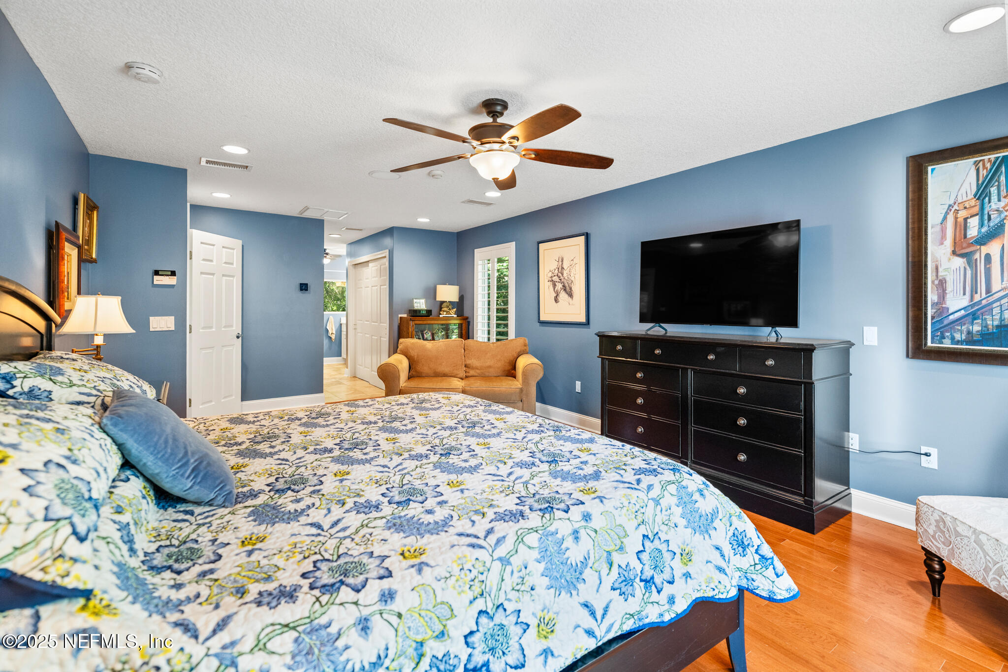 1836 Nightfall Drive Neptune Beach, FL 32266 - Photo 17 of 56 a bedroom with a bed and a flat screen tv on dresser