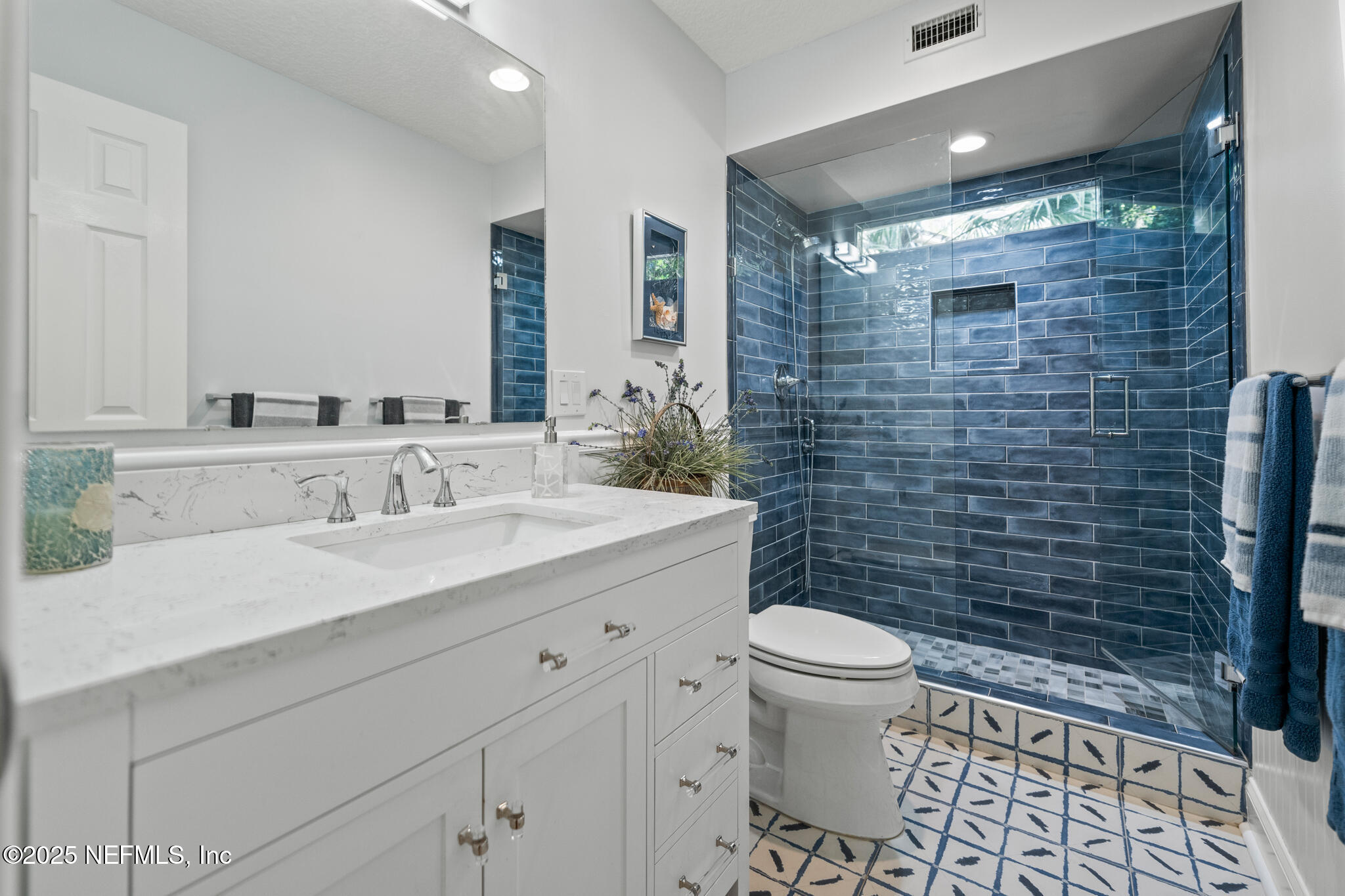 1836 Nightfall Drive Neptune Beach, FL 32266 - Photo 27 of 56 a bathroom with a sink a toilet and shower