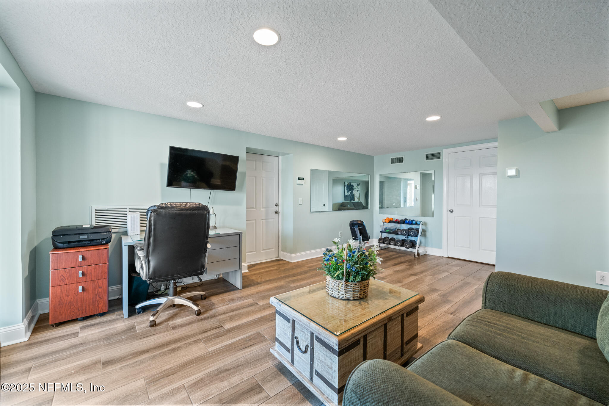 1836 Nightfall Drive Neptune Beach, FL 32266 - Photo 29 of 56 a living room with furniture and a flat screen tv