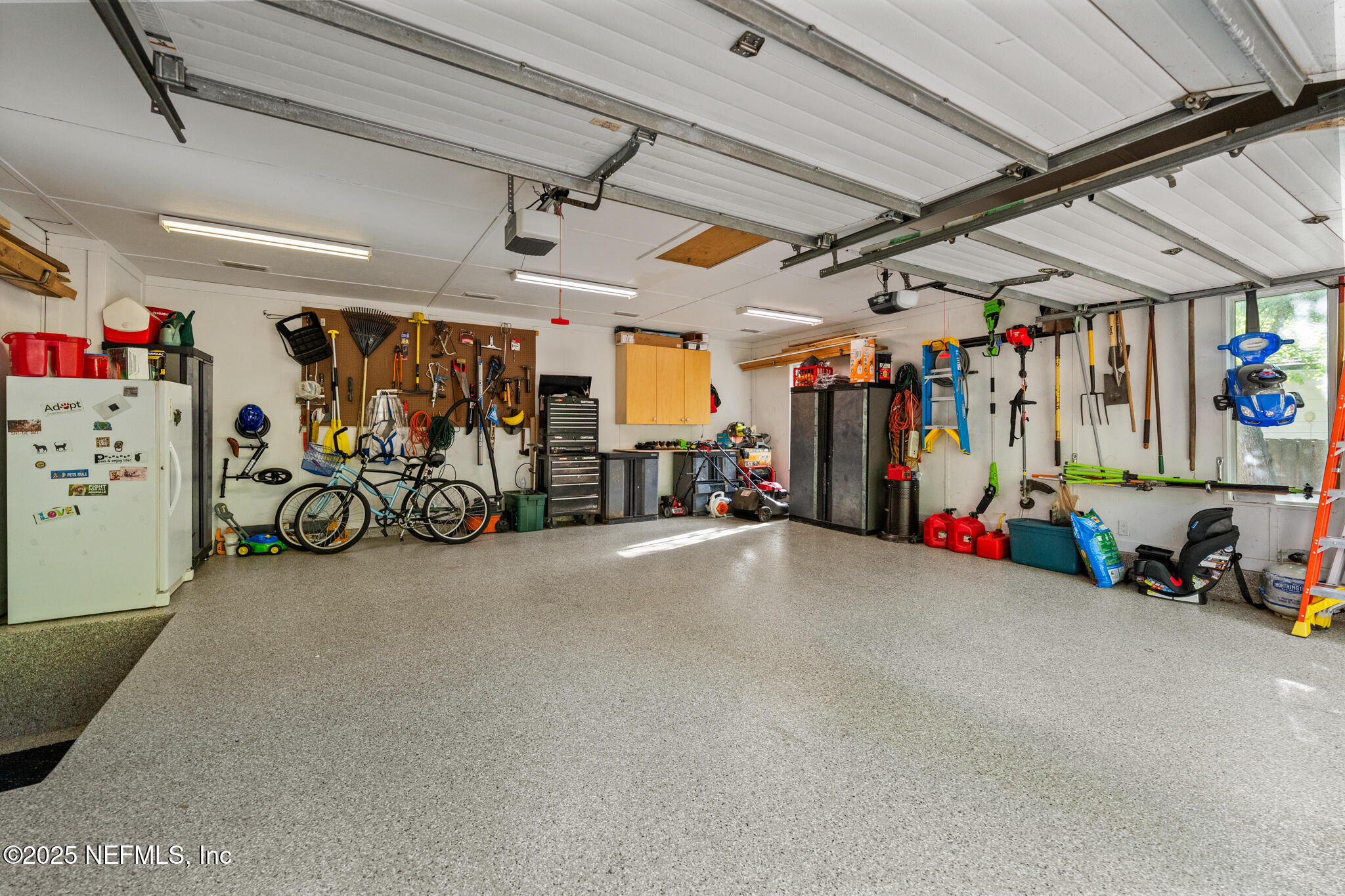 1836 Nightfall Drive Neptune Beach, FL 32266 - Photo 42 of 56 a view of a garage with rack and bicycle