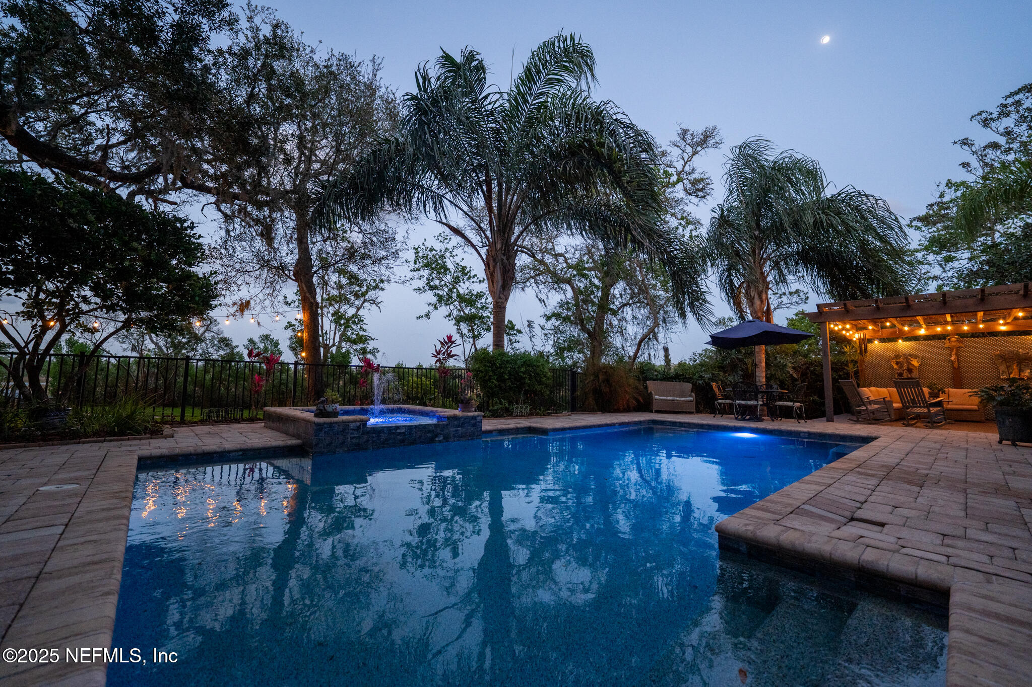 1836 Nightfall Drive Neptune Beach, FL 32266 - Photo 47 of 56 a view of a swimming pool with lounge chairs