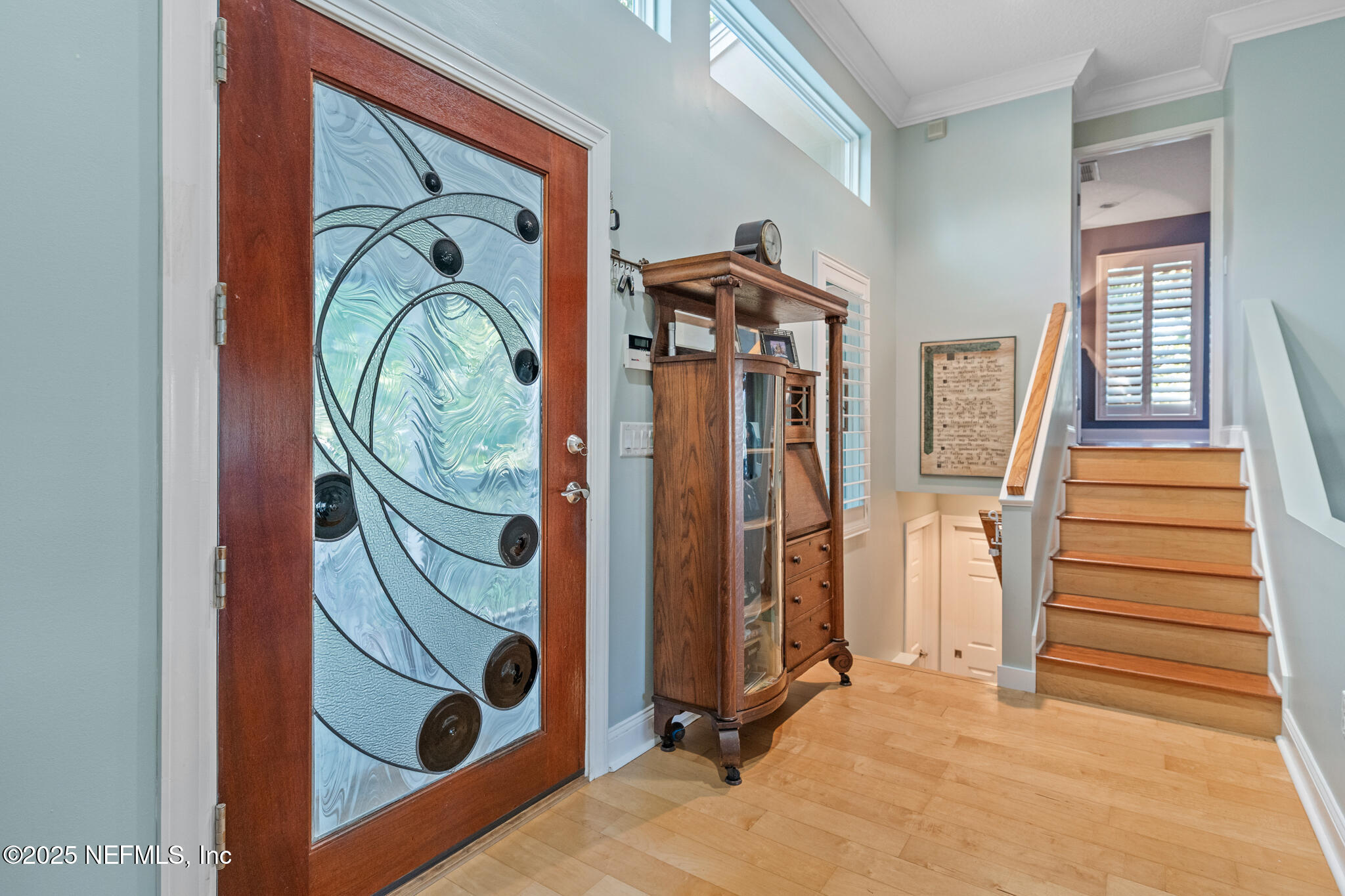 1836 Nightfall Drive Neptune Beach, FL 32266 - Photo 5 of 56 a view of an entryway with wooden floor and windows